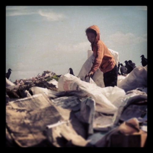 Girl sorting trash at Granada dump